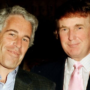 Portrait of American financier Jeffrey Epstein (left) and real estate developer Donald Trump as they pose together at the Mar-a-Lago estate, Palm Beach, Florida, 1997.(Photo by Davidoff Studios/Getty Images)
