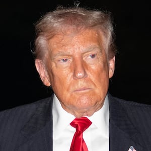 US President Donald Trump arrives to the White House in Washington, DC, following a trip to Palm Beach, Florida with a stop at a Washington Commanders football game on November 9, 2025.