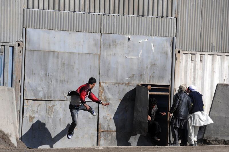 galleries/2012/02/23/quran-burning-protests-turn-deadly-in-afghanistan-photos/afghanistan-koran-burning-protest-door_jatgsh