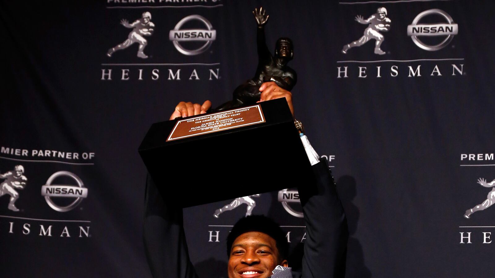 articles/2013/12/16/fsu-quarterback-jameis-winston-wins-heisman-trophy/131215-winston-heisman-tease_tvsqoj