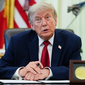 U.S. President Donald Trump looks on on the day he signs an executive order on vehicle repairs in the Oval Office at the White House in Washington, D.C., U.S., June 29, 2026. REUTERS/Aaron Schwartz