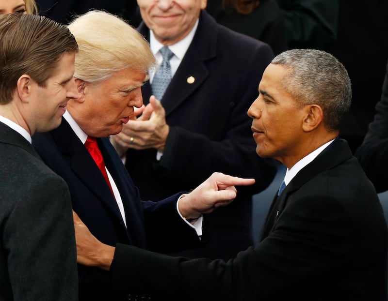 Donald Trump and son Eric Trump speak with outgoing President Barack Obama