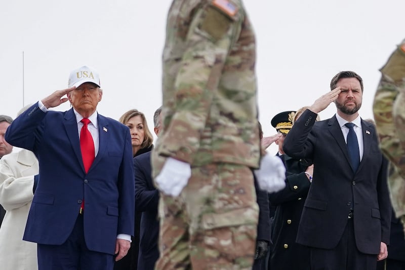 U.S. President Donald Trump and Vice President JD Vance salute during a dignified transfer of the remains of six U.S. Army service members of the 103rd Sustainment Command, who were killed in Kuwait, Major Jeffrey O'Brien, Capitain Cody Khork, Chief Warrant Officer 3 Robert Marzan, Sergeant 1st Class Nicole Amor, Sergeant 1st Class Noah Tietjens and Sergeant Declan Coady, amid the U.S.-Israeli conflict with Iran, at Dover Air Force Base in Dover, Delaware, U.S., March 7, 2026. REUTERS/Nathan Howard