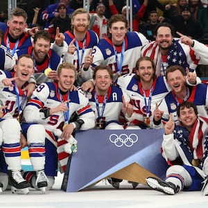 Gold medalists, Team United States, pose for a team photo during the medal ceremony following the Men's Gold Medal match between Canada and the United States.