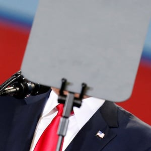 U.S. President Donald Trump is obscured by a teleprompter as he speaks about tax reform in Harrisburg, Pennsylvania, U.S., October 11, 2017.   REUTERS/Joshua Roberts