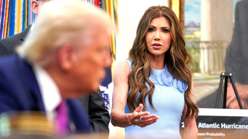 Kristi Noem speaks about the Federal Emergency Management Agency next to Donald Trump, in the Oval Office at the White House, in Washington, D.C., U.S., June 10, 2025.