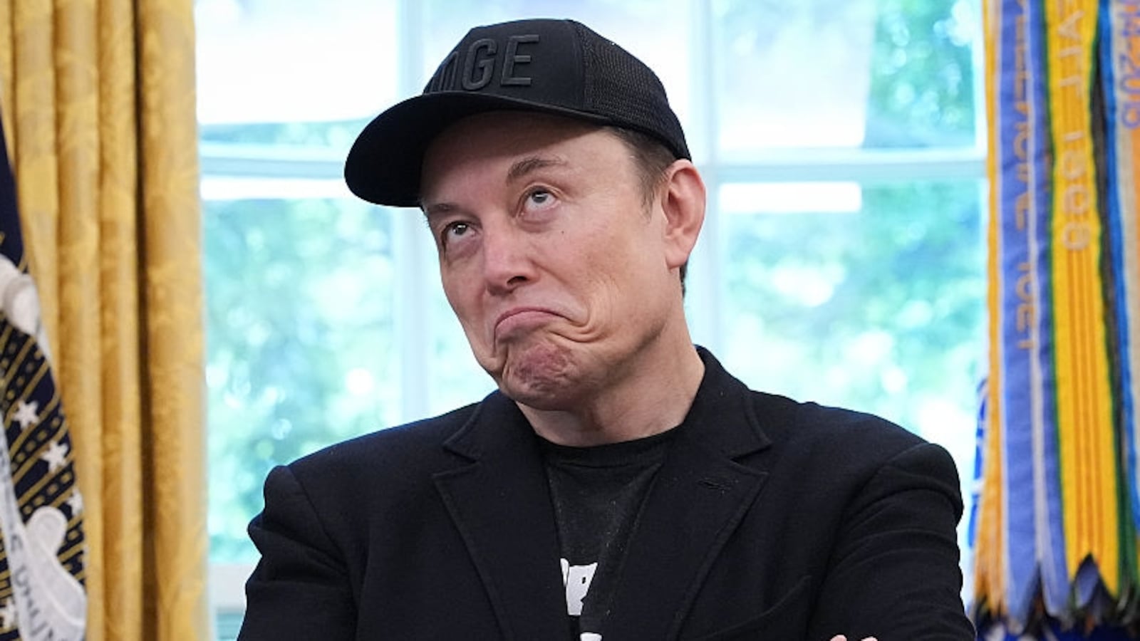 Tesla CEO Elon Musk speaks alongside U.S. President Donald Trump to reporters in the Oval Office of the White House on May 30, 2025 in Washington, DC. Musk, who served as an adviser to Trump and led the Department of Government Efficiency, announced he would leave his role in the Trump administration to refocus on his businesses. (Photo by Kevin Dietsch/Getty Images)