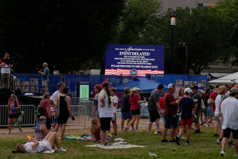 A screen displays a severe weather warning message, during the Great American State Fair on the National Mall.
