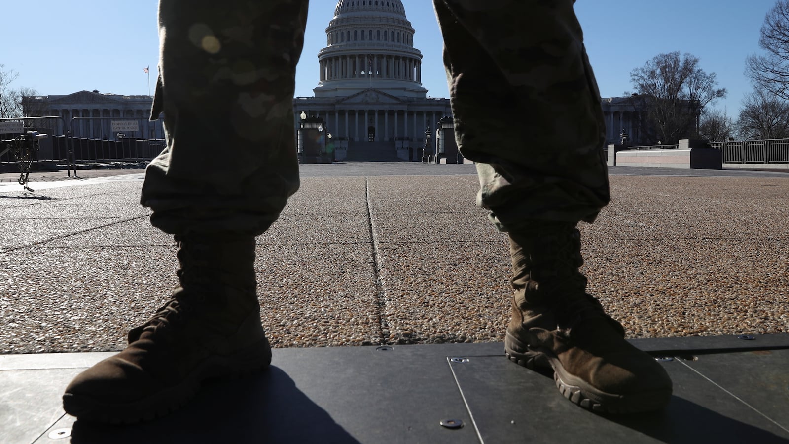 2021-03-04T021453Z_802036633_RC224M9D2WYG_RTRMADP_3_USA-CAPITOL-SECURITY_c8oiho