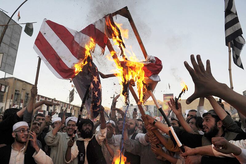 articles/2012/09/23/u-s-squandering-the-pr-opportunity-of-the-arab-spring/burn-us-flag-cheat_xb9z5c