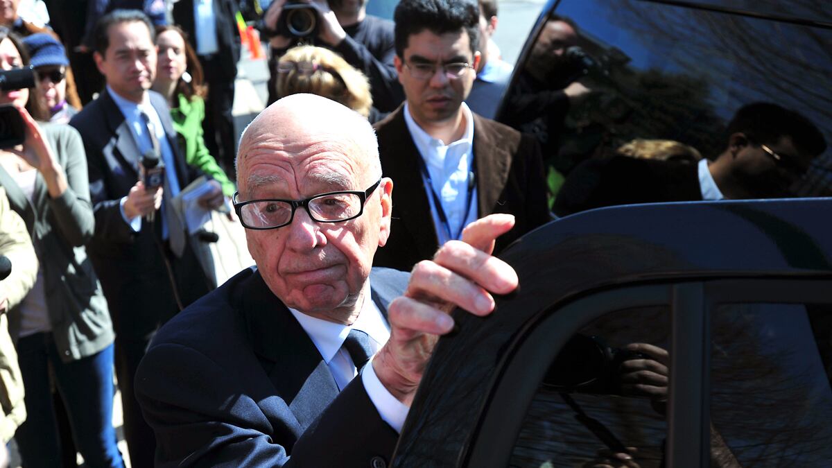 articles/2012/07/22/rupert-murdoch-isn-t-getting-out-of-newspapers/murdoch-steps-down-box_clk2ni