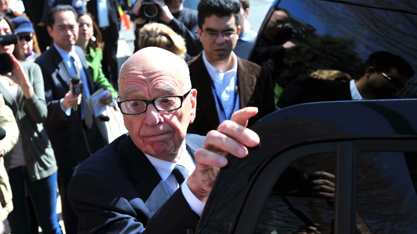 articles/2012/07/22/rupert-murdoch-isn-t-getting-out-of-newspapers/murdoch-steps-down-box_clk2ni