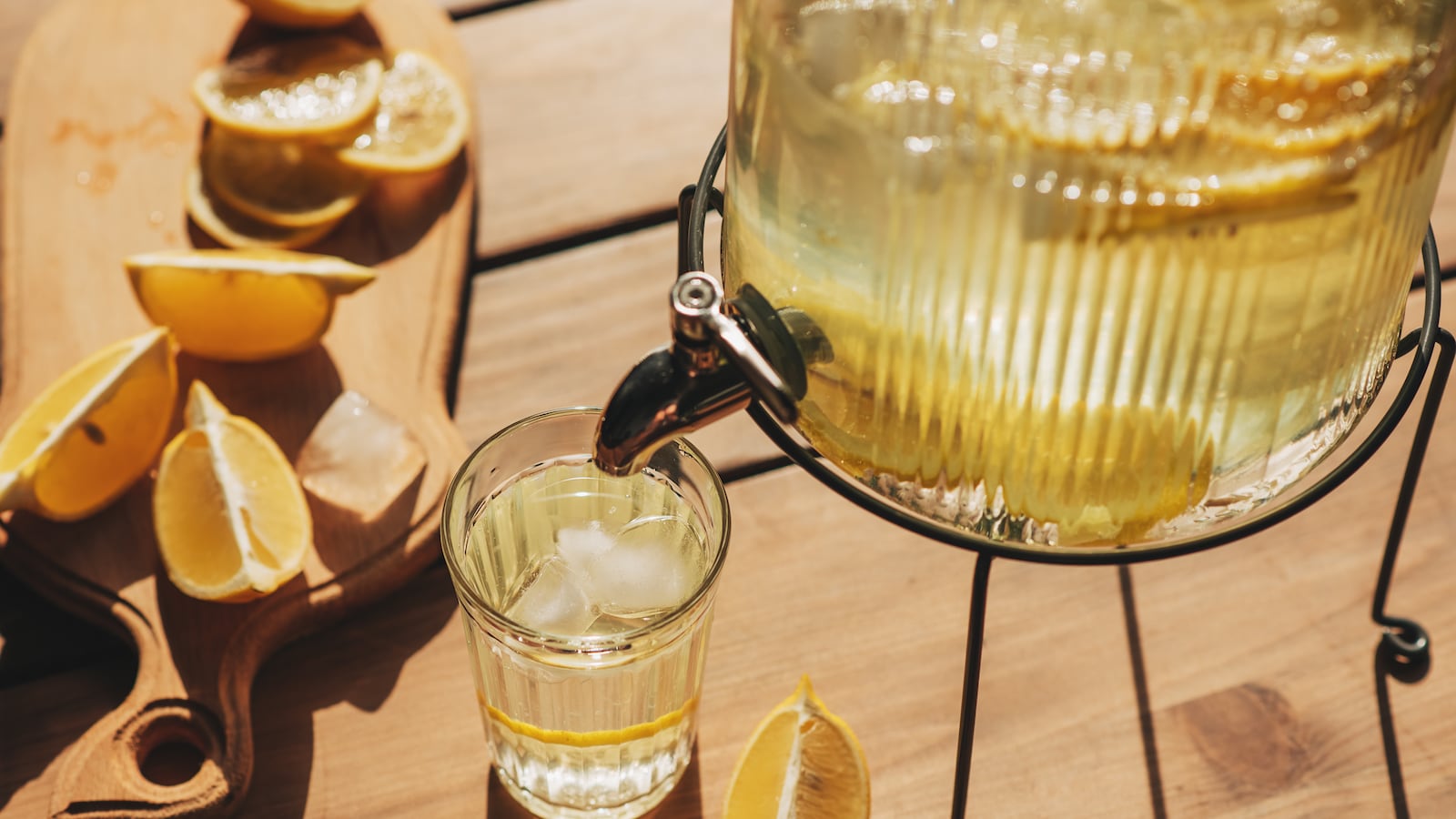 Lemonade with ice in a pitcher