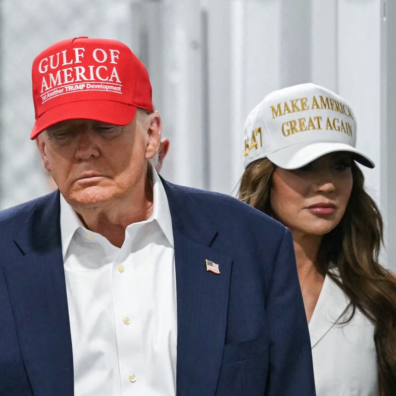 Ron DeSantis, Donald Trump and Kristi Noem