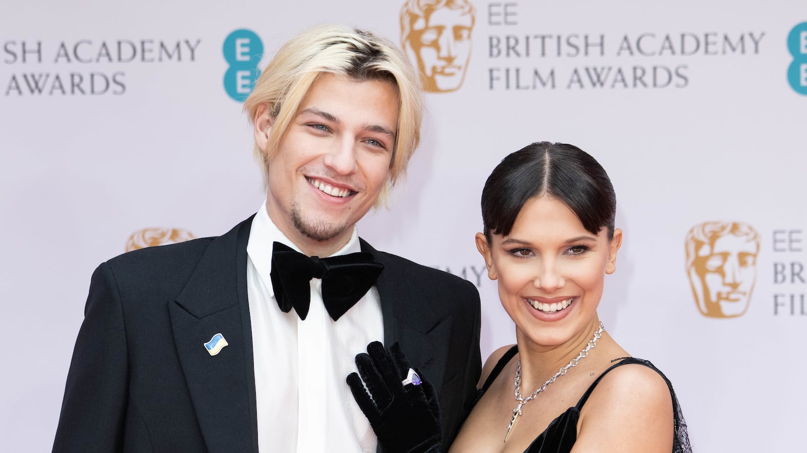 Jake Bongiovi and Millie Bobby Brown attend an award ceremony in 2022.
