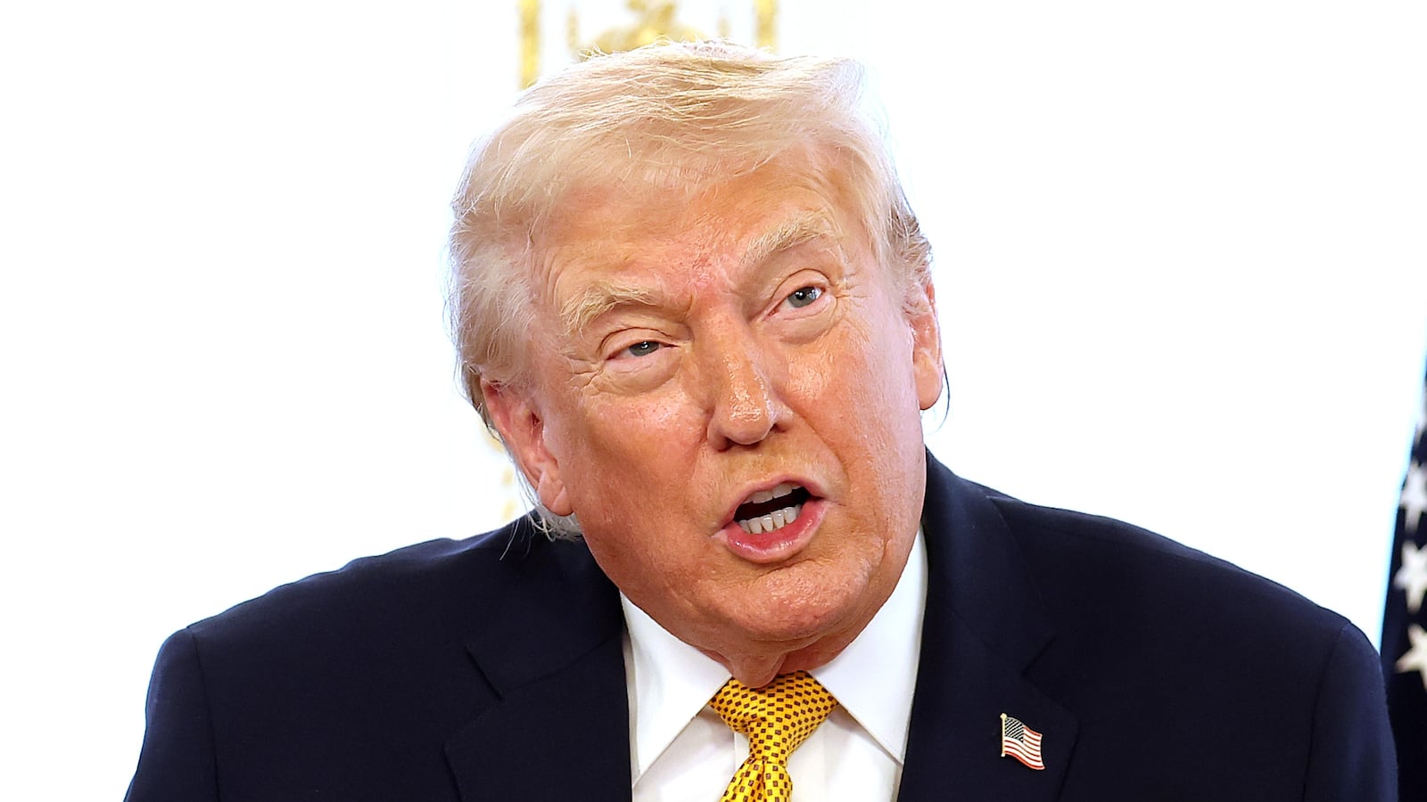 President Donald Trump calls service members on Christmas Eve at the Mar-a-Lago resort on December 24, 2025 in Palm Beach, Florida. Trump is spending the holidays in Florida this year.