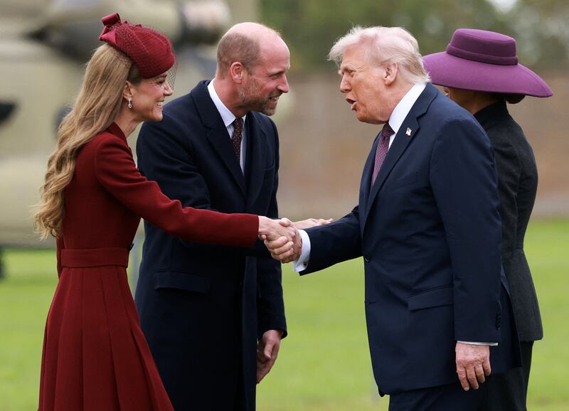 TOPSHOT - US President Donald Trump and First Lady Melania Trump are greeted by Britain's Prince William, Prince of Wales and Britain's Catherine, Princess of Wales, upon their arrival at the grounds of Windsor Castle, in Windsor, on September 17, 2025, for the start of a second State Visit. (Photo by Ian Vogler / POOL / AFP) (Photo by IAN VOGLER/POOL/AFP via Getty Images)