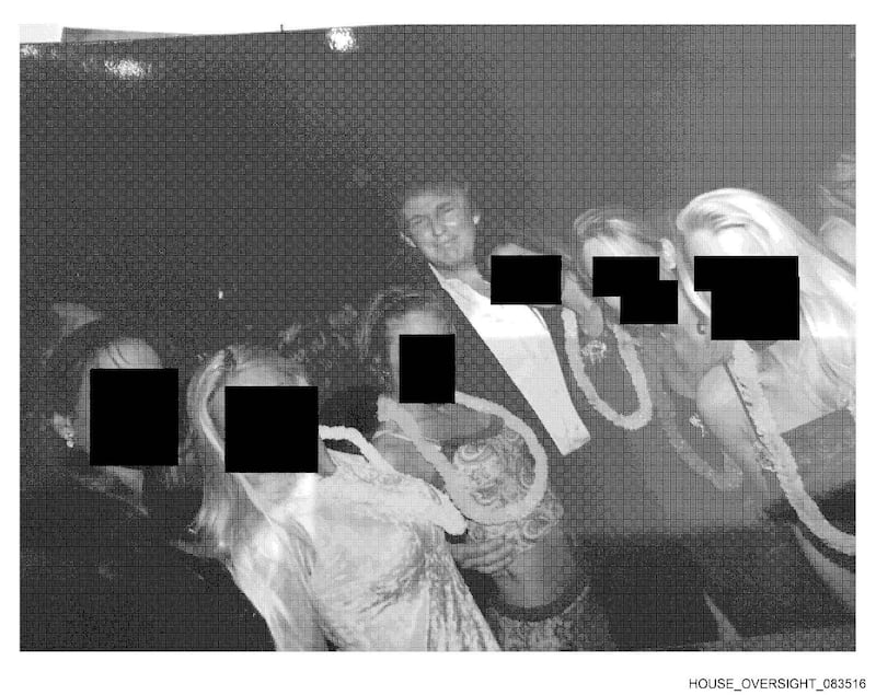 Trump is featured in a photo with five women with their faces blocked out.