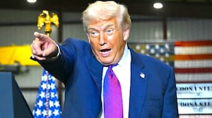 Donald Trump reacts as he's greeted by attendees to his speech about the economy at the Coosa Steel Corporation factory in Rome, Georgia, on February 19, 2026.