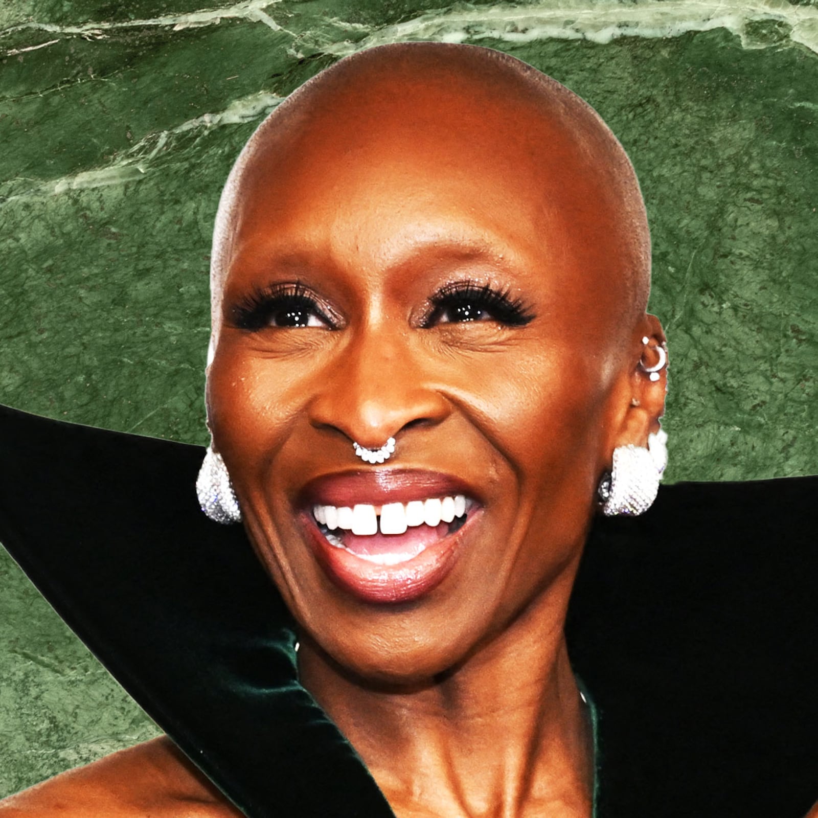 Cynthia Erivo on top of a green marble background