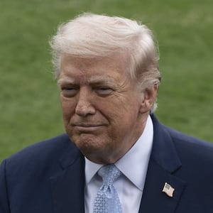 WASHINGTON DC, UNITED STATES - MARCH 20: United States President Donald Trump (L) speaks to the press before his departs the White House en route Miami, Florida on March 20, 2026, in Washington DC. Also The United States Secretary of State Marco Rubio (R) is seen. (Photo by Celal Gunes/Anadolu via Getty Images)