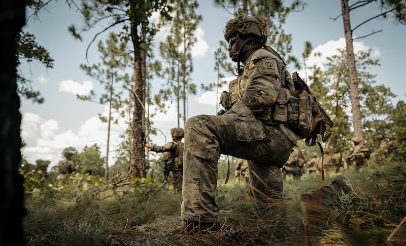 A Paratrooper assigned to 2nd Battalion, 504th Parachute Infantry Regiment “White Devils,” 1st Brigade Combat Team, 82nd Airborne Division gets ready to conduct live fire exercises during Devil Avalanche at Fort Bragg, North Carolina, July 28, 2025.