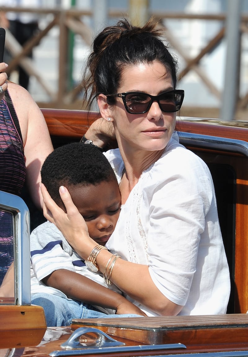 Actress Sandra Bullock and son Louis Bardo Bullock are seen during the 70th Venice International Film Festival on August 27, 2013