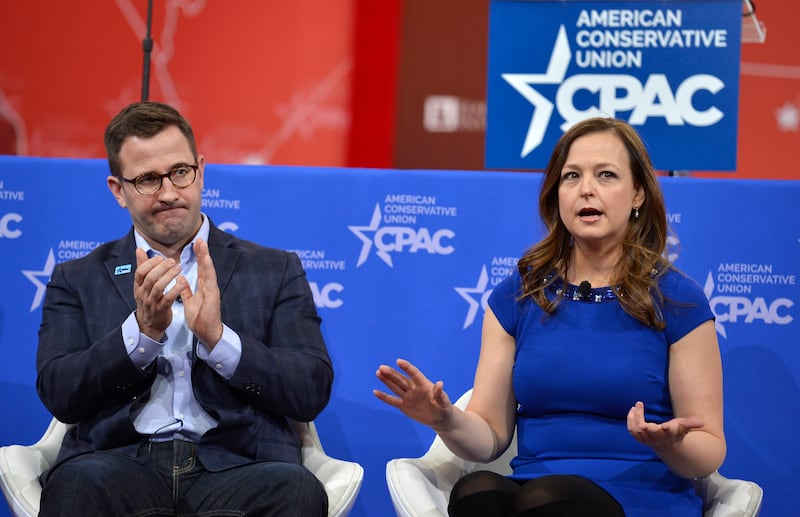 Tea Party Patriots leader Jenny Beth Martin (R) makes remarks during a forum on the 2016 elections as American Majority member Ned Ryun applauds at the Conservative Political Action Conference (CPAC) in National Harbor, Maryland February 28, 2015. CPAC closes after three days where thousands of conservative activists, Republicans and Tea Party Patriots gathered to hear politicians, presidential hopefuls, and business leaders speak, lobby and network for a conservative agenda, before the presidential election in 2016. REUTERS/Mike Theiler (UNITED STATES - Tags: POLITICS)