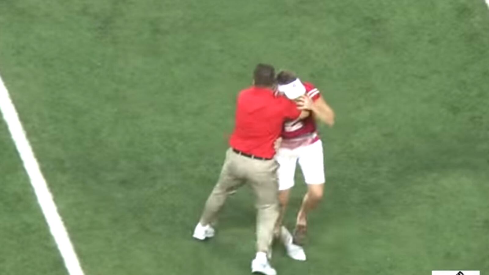 articles/2014/09/29/viral-video-of-the-day-ohio-state-coach-slams-fan-on-field/140929-viralvid-football-tease_kwxffx
