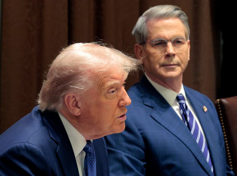 Treasury Secretary Scott Bessent listens as U.S. President Donald Trump in the Cabinet Room at the White House on April 24, 2025 in Washington, DC.