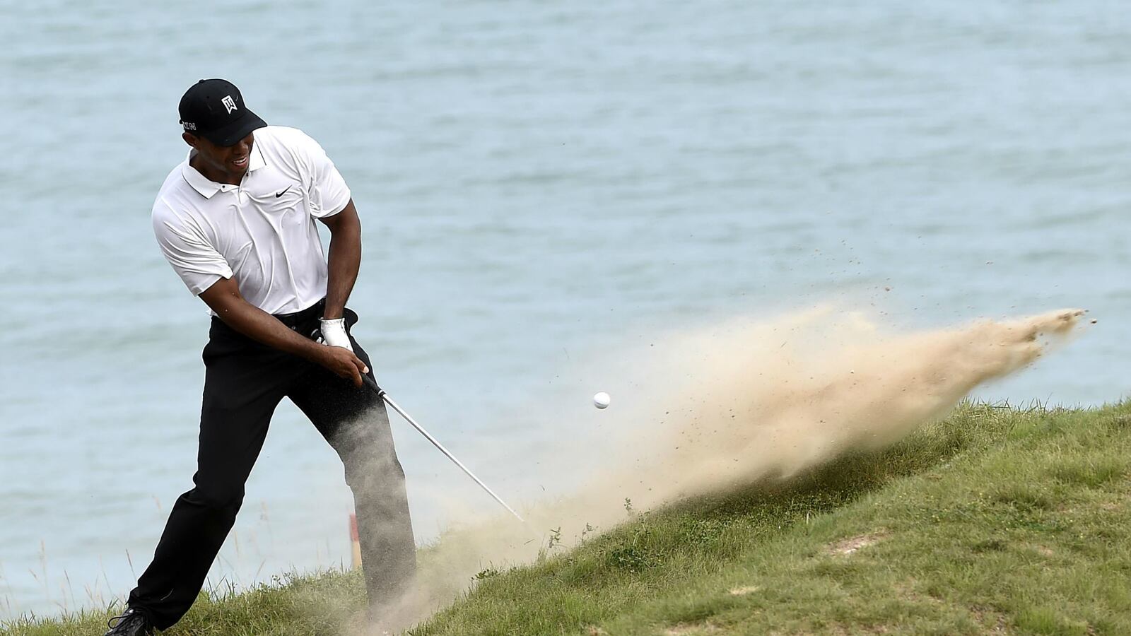 cheats/2015/09/19/tiger-woods-out-until-2016/150919-tiger-woods-cheat_ug9bms