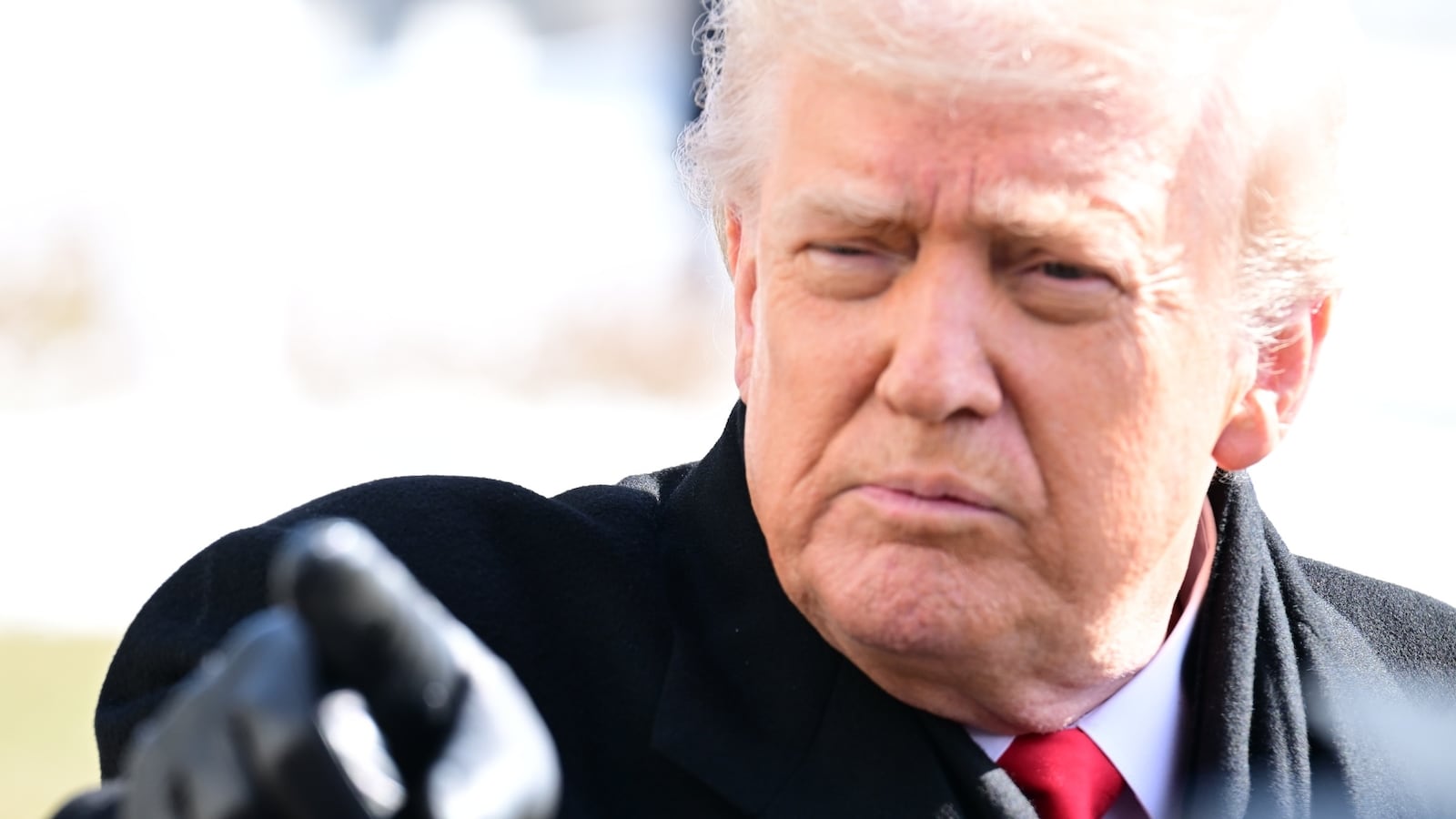 President of the United States Donald J. Trump speaks to reporters prior to departing The White House in Washington, DC, United States on January 27, 2026.