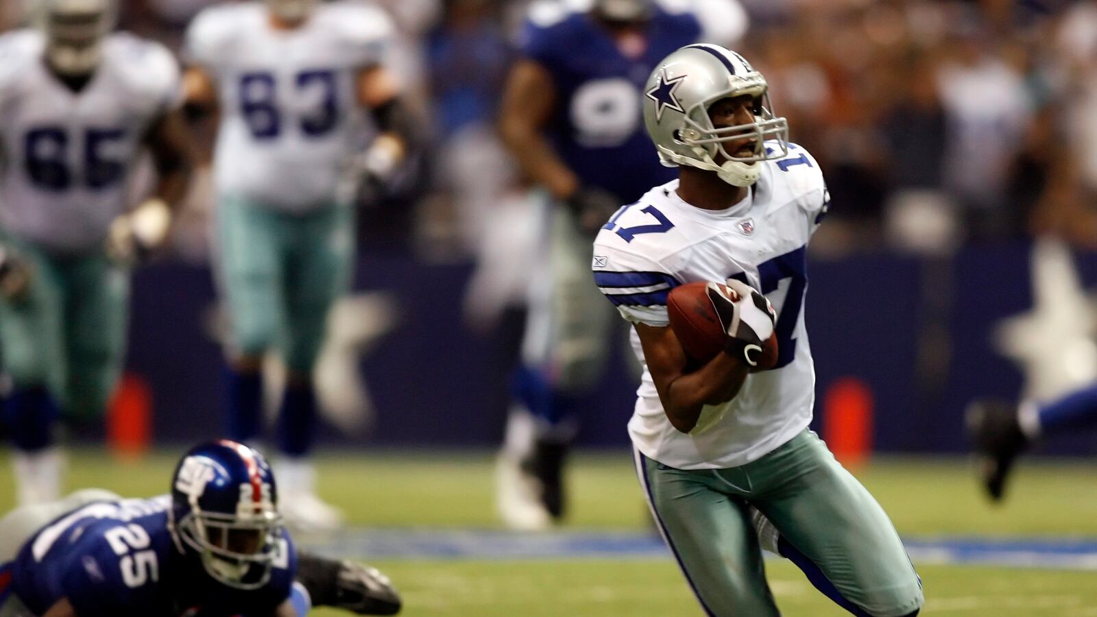 Sam Hurd sprints away from an opponent player.