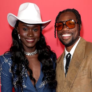 LOS ANGELES, CALIFORNIA - NOVEMBER 14: (L-R) Junelle Bromfield and Noah Lyles attend the 2024 GQ Men of the Year party at Bar Marmont on November 14, 2024 in Los Angeles, California.