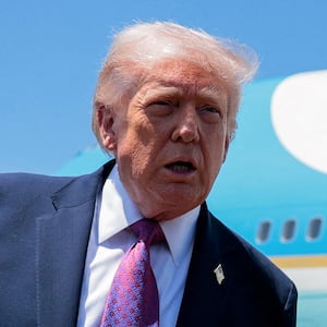 U.S. President Donald Trump speaks to the press, as he arrives at Phoenix Sky Harbor International Airport in Phoenix, Arizona, U.S., April 17, 2026.