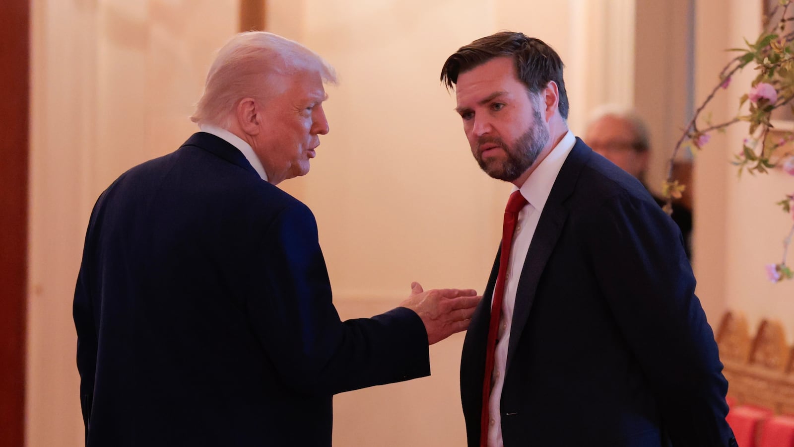 WASHINGTON, DC - MAY 08: U.S. President Donald Trump and Vice President JD Vance speak together during an event to celebrate Military Mothers in the East Room of the White House on May 08, 2025 in Washington, DC. Earlier in the day President Trump announced a trade deal with the United Kingdom. (Photo by Anna Moneymaker/Getty Images)