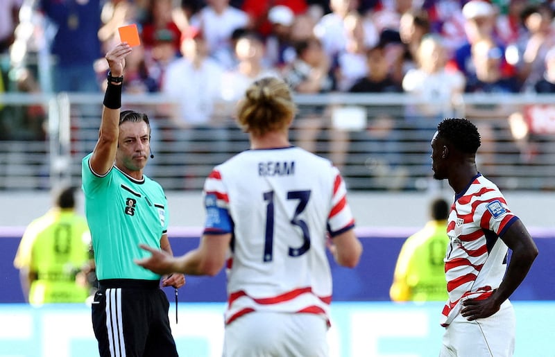 FIFA World Cup 2026 - Round of 32 - United States v Bosnia and Herzegovina - San Francisco Bay Area Stadium, Santa Clara, California, U.S. - July 1, 2026 Folarin Balogun of the U.S. is shown a red card by referee Raphael Claus REUTERS/Phil Noble/File Photo