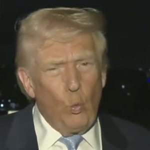 Trump on runway with reporters