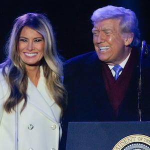 WASHINGTON, DC - DECEMBER 04: U.S. President Donald Trump and first lady Melania Trump participate in the 103rd National Christmas Tree Lighting Ceremony at the White House Ellipse on December 04, 2025 in Washington, DC. The tree is a 32-foot-tall red spruce from the George Washington and Jefferson National Forests in Virginia's Highland County. This is the second year in a row that the George Washington and Jefferson National Forests have provided the tree. (Photo by Chip Somodevilla/Getty Images)