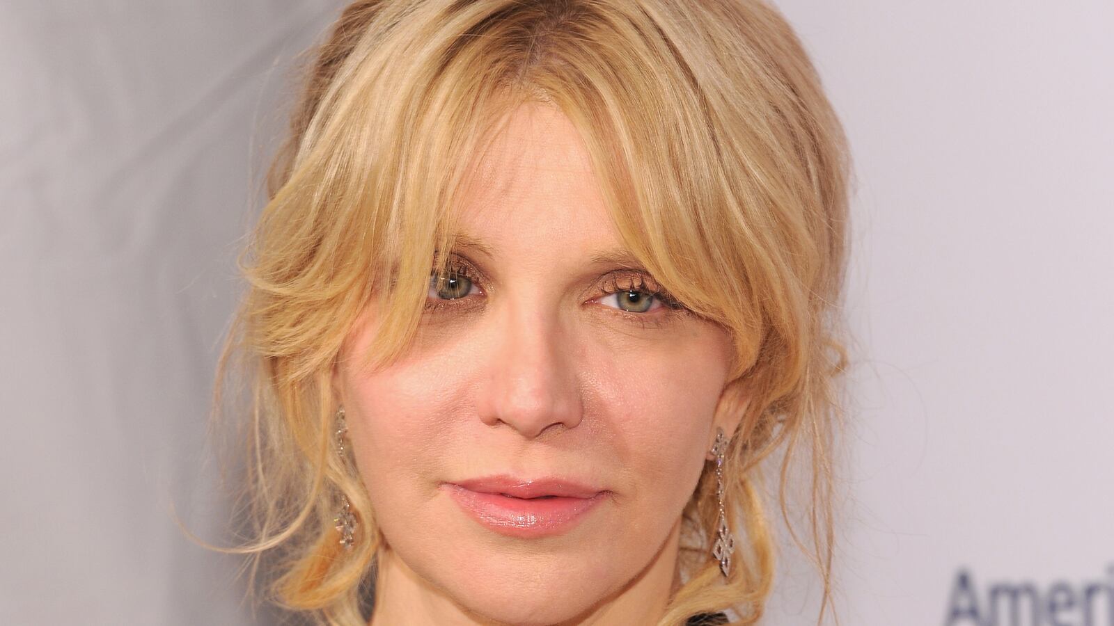 cheats/2014/01/25/courtney-love-wins-twibel-suit/140125-courtney-love-cheat_om0ijd