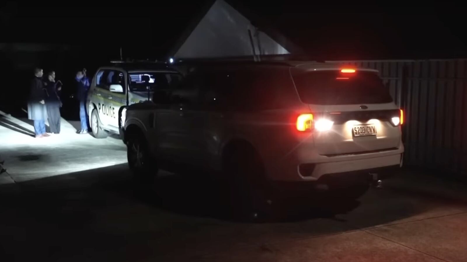 Police car at the scene of the crime.