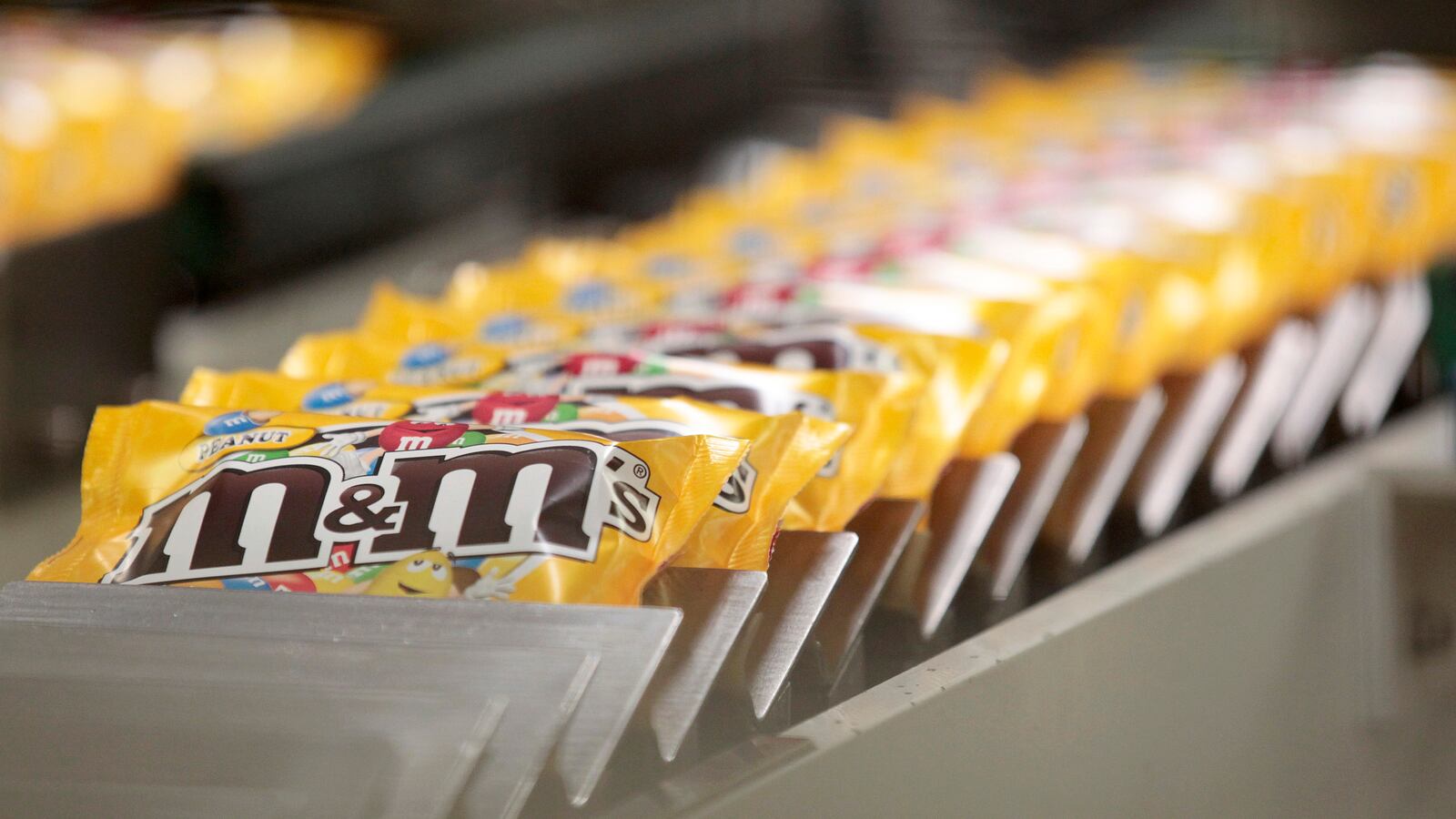 Packets of M&M's on a production line