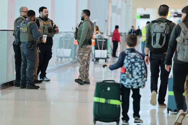 NEW YORK, NEW YORK - MARCH 24: Immigration and Customs Enforcement (ICE) agents patrol Terminal C at LaGuardia Airport on March 24, 2026 in New York, New York. The travel disruptions continue as hundreds of TSA agents quit or work without pay during a partial government shutdown. U.S. President Donald Trump deployed ICE agents to U.S. airports on Monday, with border czar Tom Homan in charge of the effort. (Photo by Michael M. Santiago/Getty Images)