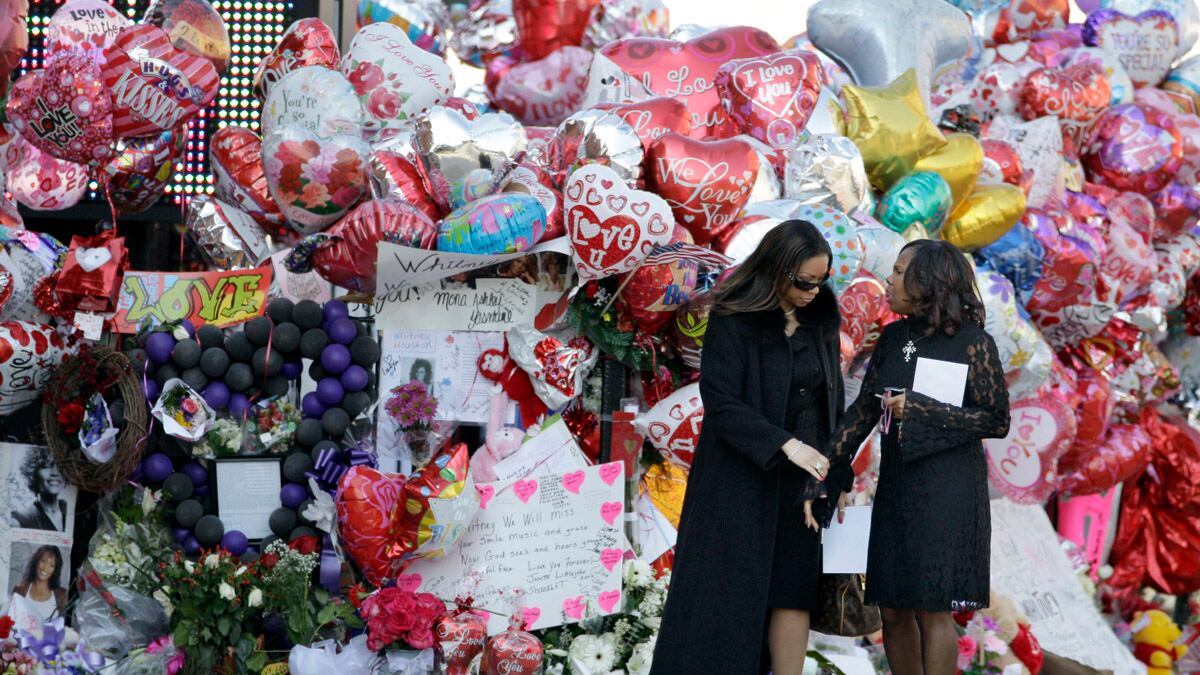 articles/2012/02/19/sending-whitney-home-at-an-emotional-service/whitney-houston-funeral-samuels_ph96bt