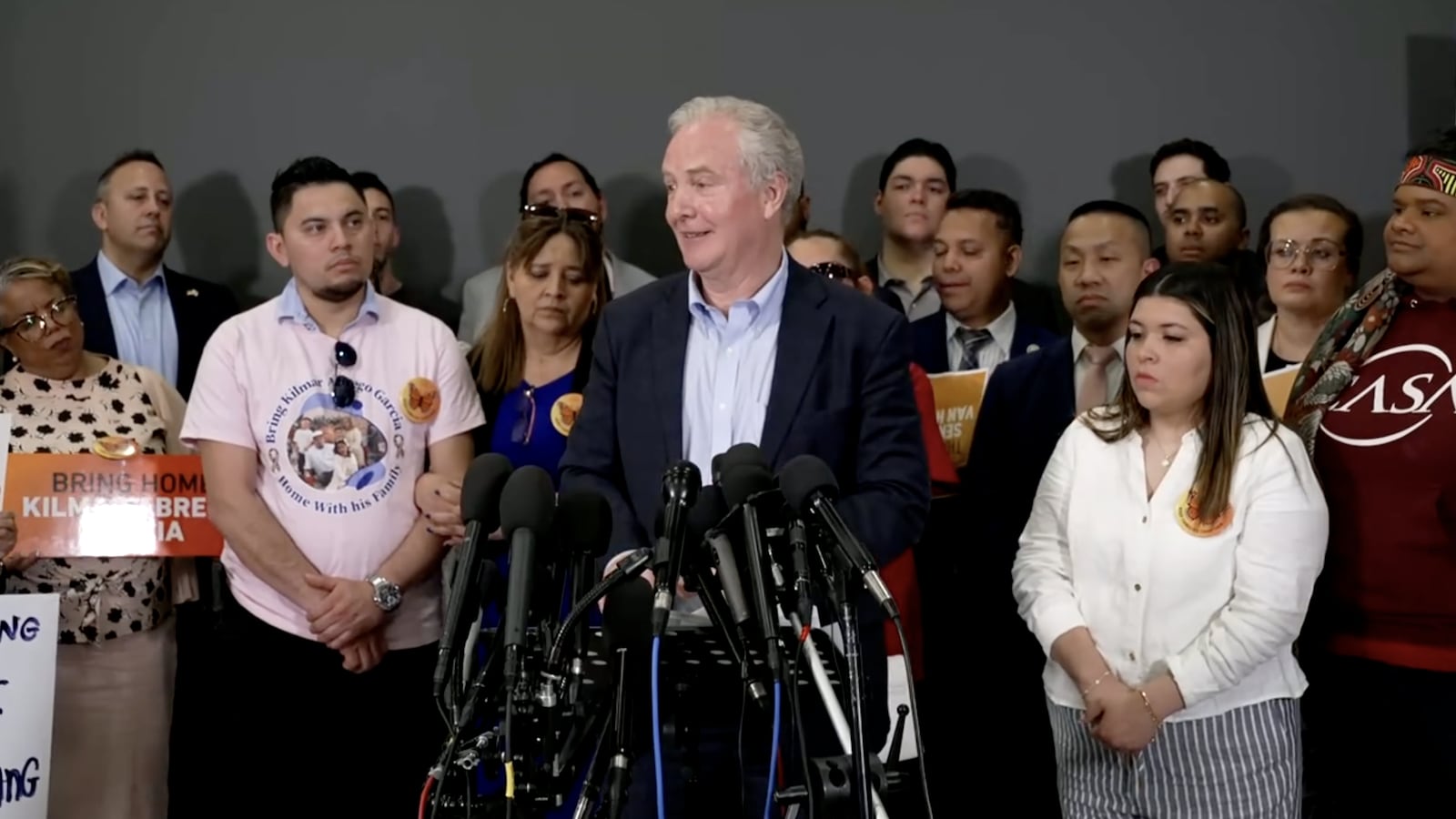 Senator Chris Van Hollen giving a press conference