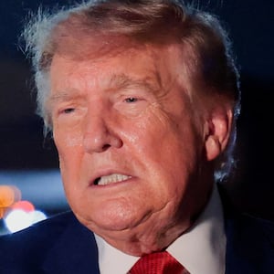U.S. President Donald Trump speaks to members of the media after disembarking Air Force One at Joint Base Andrews, Maryland, U.S., August 11, 2026. REUTERS/Kylie Cooper