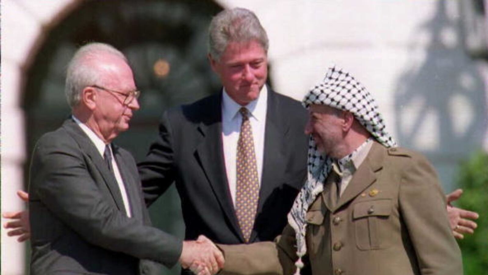 articles/2012/11/07/appoint-bill-clinton-peace-envoy/clinton-handshake-openz_qx9yue