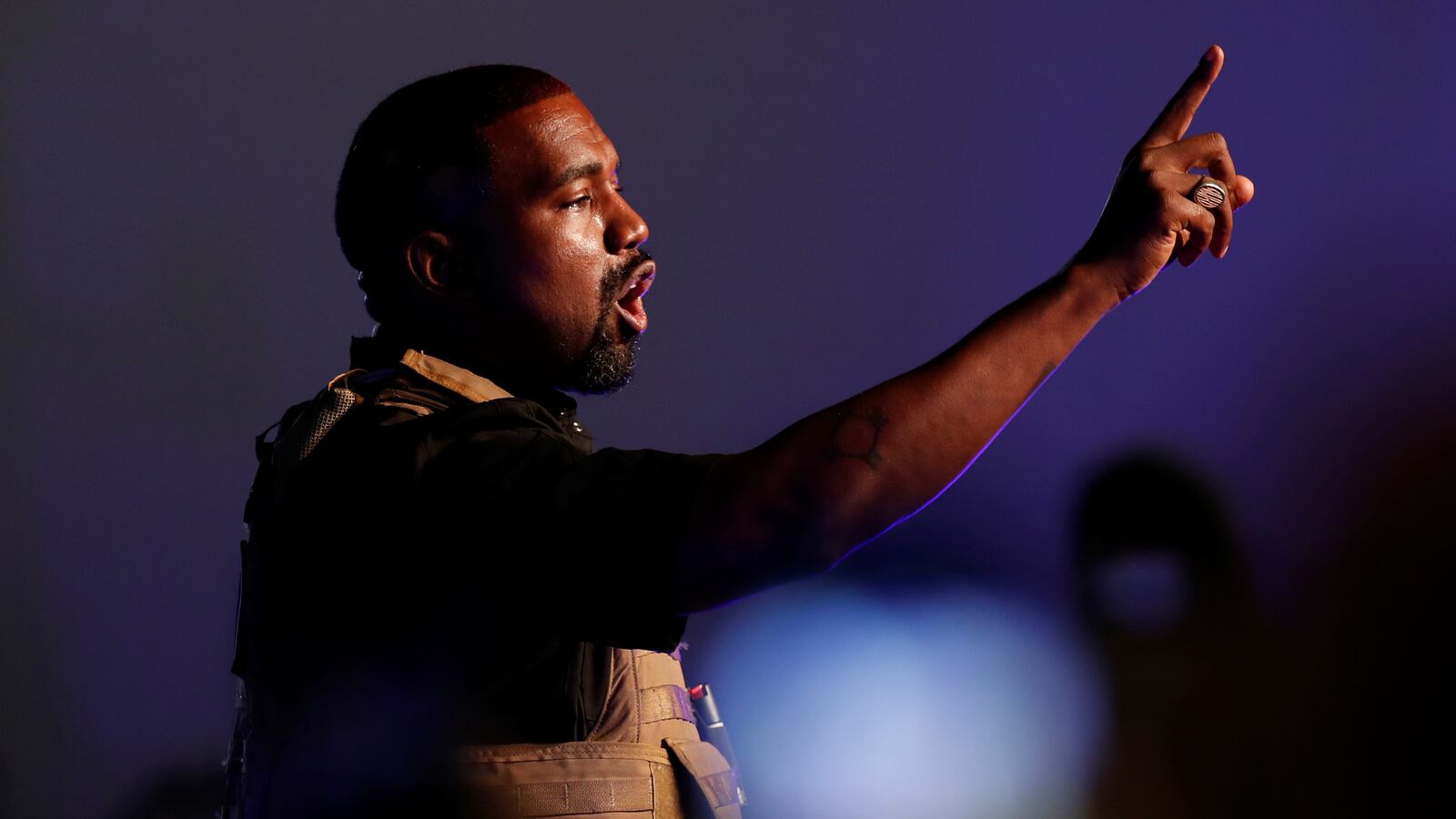 Rapper Kanye West gestures to the crowd as he holds his first rally in support of his presidential bid in North Charleston, South Carolina, U.S. July 19, 2020.