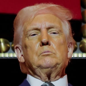 U.S. President Donald Trump gestures stands at the presidential box at the Kennedy Center, in Washington, D.C., U.S., March 17, 2025. REUTERS/Carlos Barria