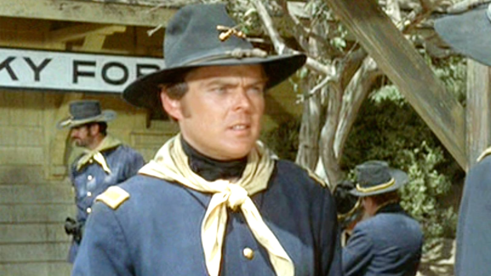 TUSCON - DECEMBER 18: RIO LOBO, theatrical movie originally released December 18, 1970. Film directed by Howard Hawks. Pictured, Edward Faulkner (as Lieutenant Harris), facing John Wayne (as Colonel Cord McNally, back to camera). Image is a frame grab. (Photo by CBS via Getty Images)